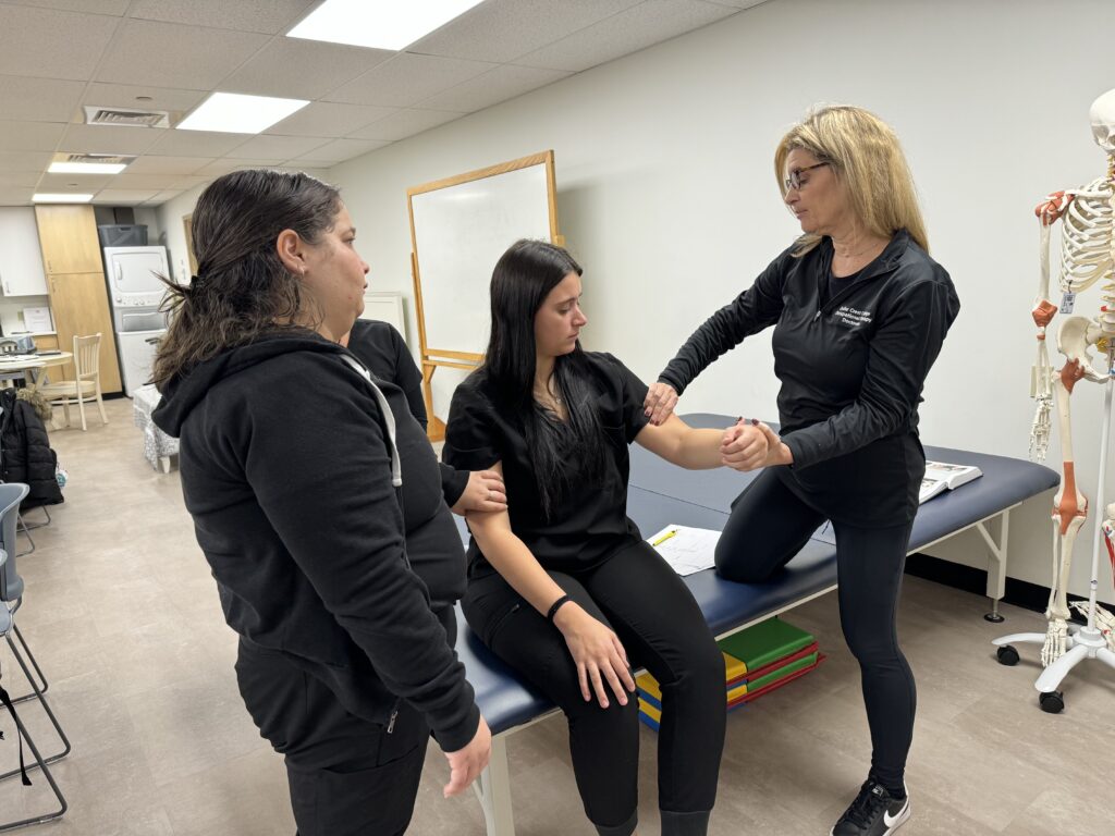 Some OTD students working with a patient