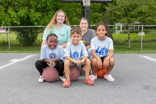 Students with basketball kids